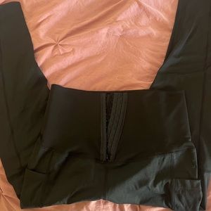 All black waist training workout leggings.